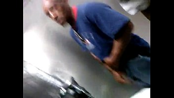black guy caught pissing/showing his BBC at urinal
