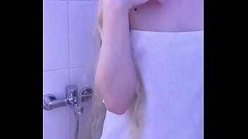 cute girl shoots herself on camera in the shower