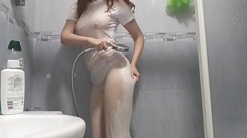 white shirt and tights shower with a redhead