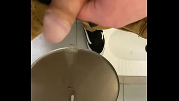 Playing with soft cock in public toilet